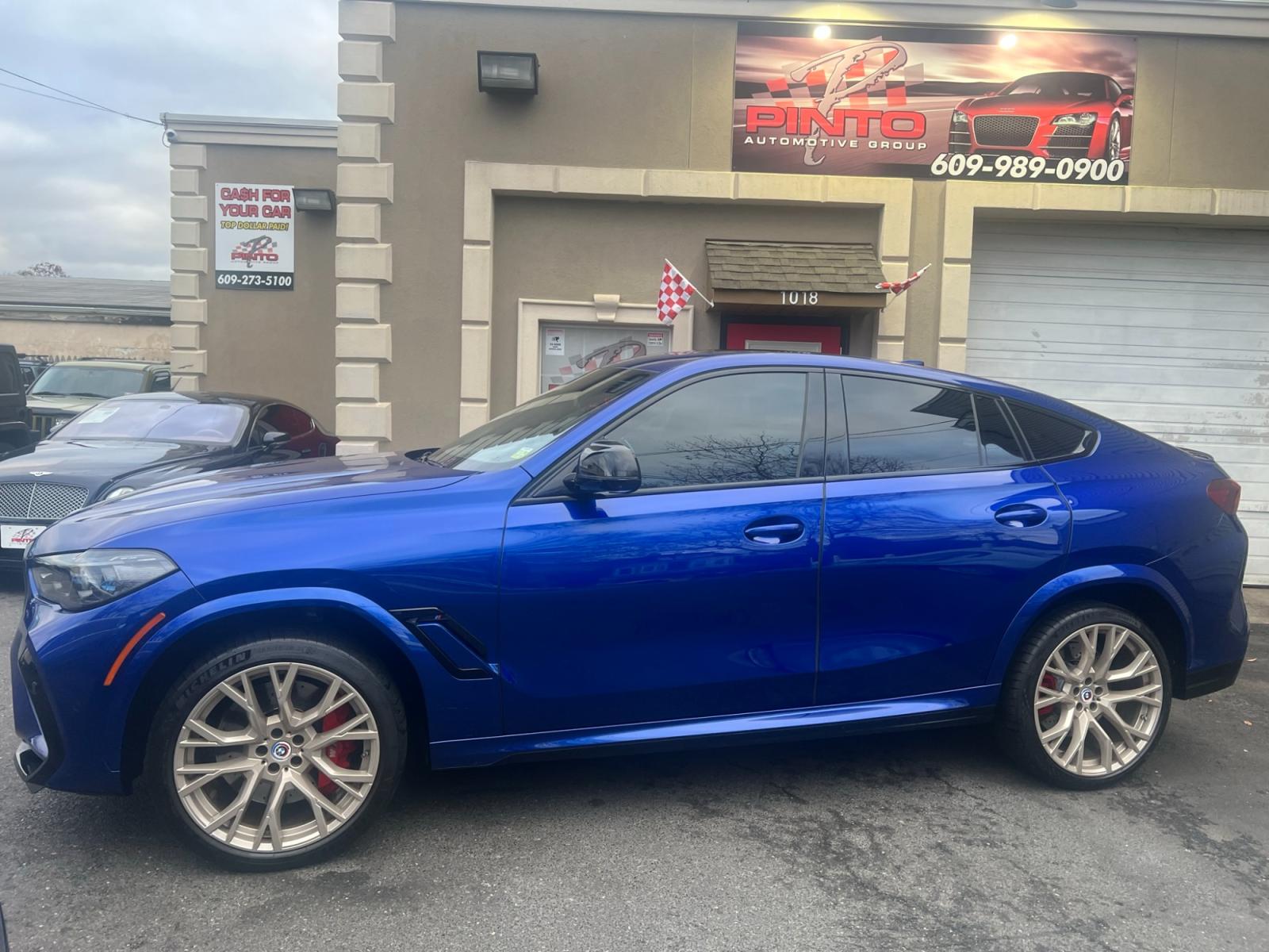 2022 Blue /Red/Black BMW X6 M Base (5YMCY0C07N9) with an 4.4L V8 DOHC 32V engine, 8A transmission, located at 1018 Brunswick Ave, Trenton, NJ, 08638, (609) 989-0900, 40.240086, -74.748085 - Holy Cow and Wow!!...That is the description on this absolutely stunning BMW X6 M Competition! Ordered by Anthony himself with the best color choice of Marina Bay Blue metallic and Red Interior to stand out on the road and to any enthusiast of the BMW X series! Executive Pkg. includes Remote Start, - Photo #30